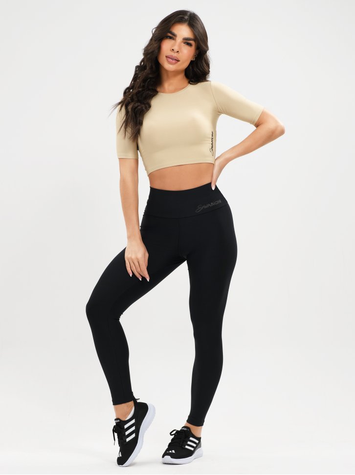 conjunto legging preta e cropped bege moving savancini 73007710